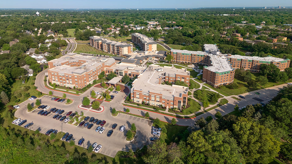 SAS Architects & Planners recently unveiled a captivating drone video capturing the beauty and thoughtful design of their latest project at Oak Trace Senior Living Community in Downers Grove. This video offers a sweeping aerial perspective of the newly completed Independent Living apartment building and Clubhouse addition — the final piece of a visionary master plan that’s been in the works since 2015.